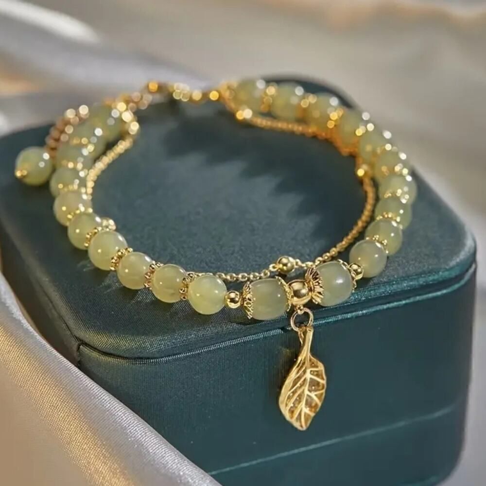 Green Beaded Bracelet with Golden Leaf Charm Layered